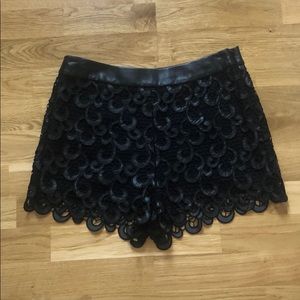 Endless rose leather and lace shorts